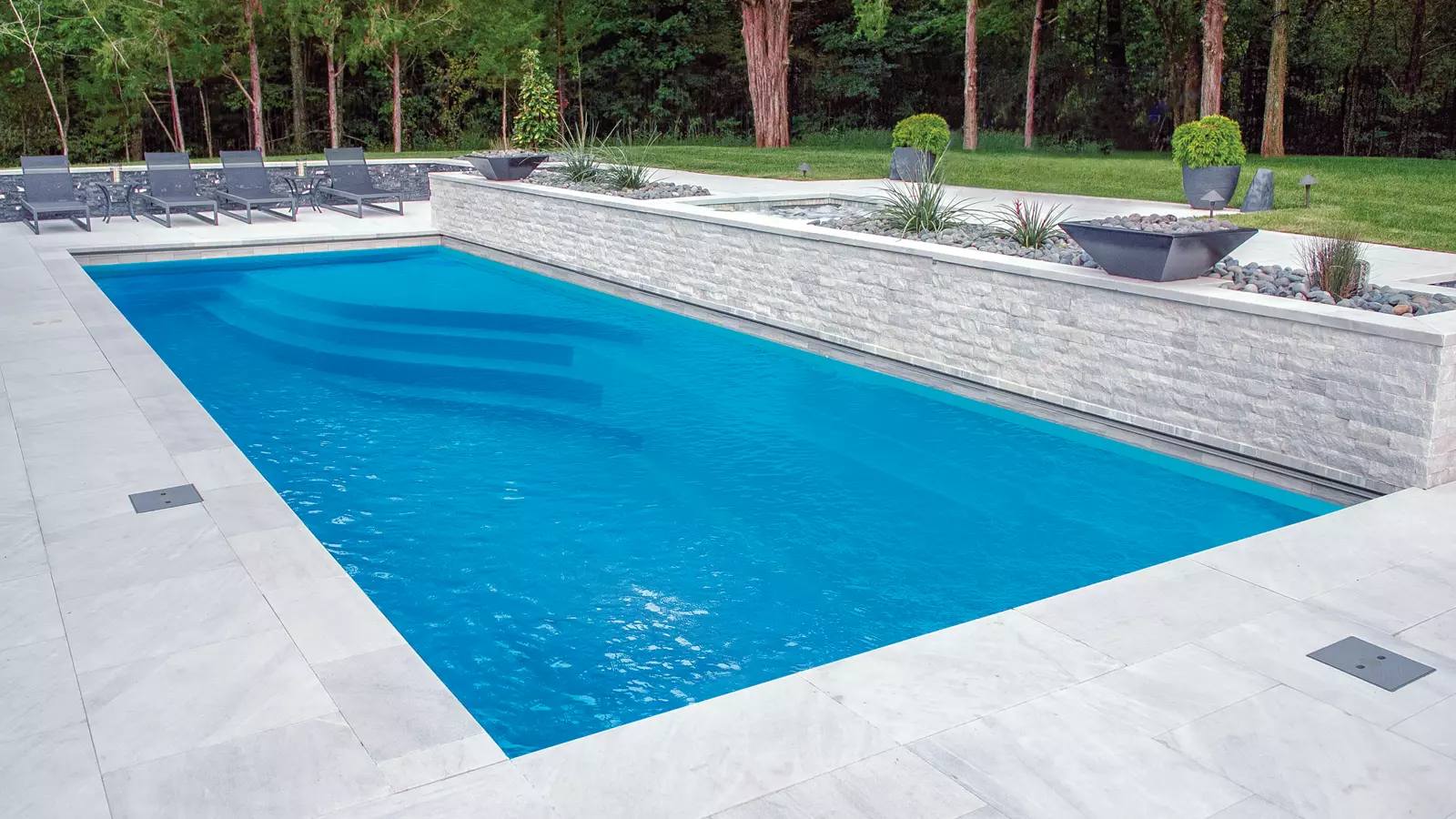 Leisure-Pools-Wave-Fiberglass-Swimming-Pool The Wave modern rectangular fiberglass swimming pool
